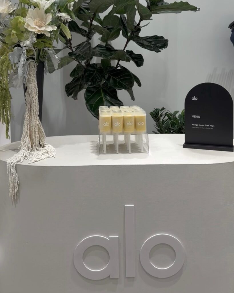 Branded mango push pops on an Alo activation counter