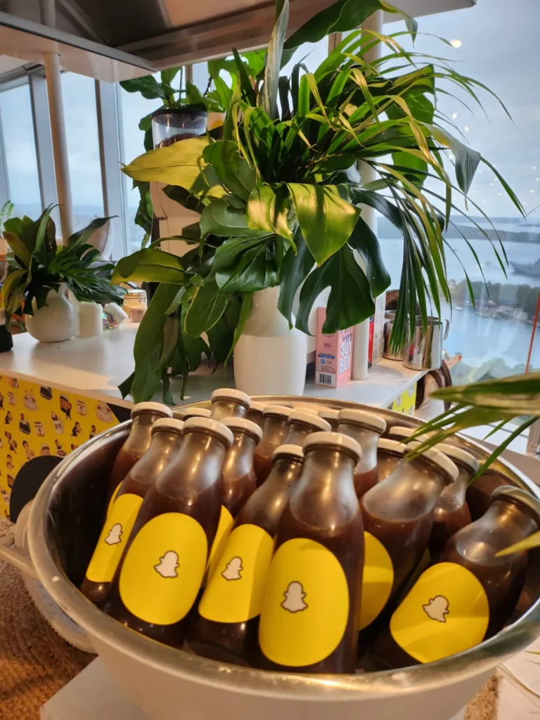 Snapchat branded iced coffee bottles on ice