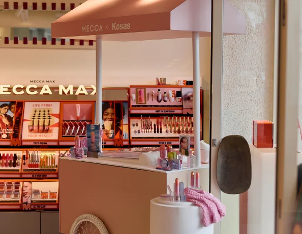 Mecca x Kosas branded beauty cart activation