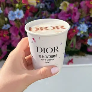 coffee latte art with dior brand name for guest